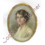 A 1920's oval portrait pastel of a female, signed lower left Mable.G. Marston, 39cm x 53cm