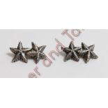 A pair of cast silver starfish cufflinks