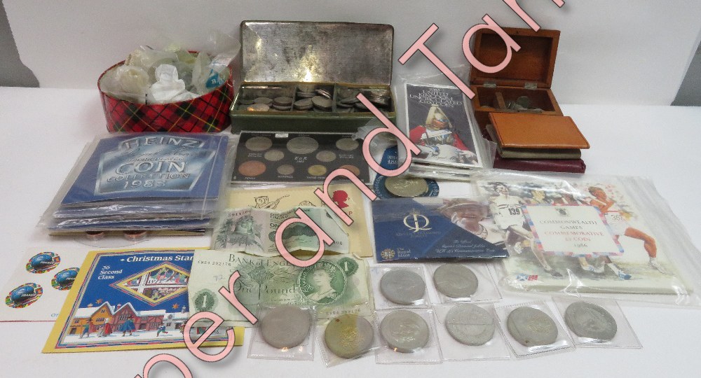 A collection of coins, mostly Victorian and later loses coins, along with various coins sets