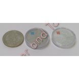Three 2010 silver coins celebrating the 2012 Olympic games, two with partial enamel decoration,