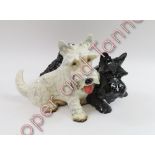 A Goebel model of Scottish terriers