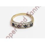 A 9 carat gold sapphire and diamond half hoop ring, finger size M ½, 2 g gross