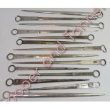 A collection of thirty six silver plated meat skewers, various sizes and designs