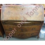 A 19th century inlaid marquetry bombe bureau, veneered throughout on cabriole legs