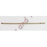 A 9 carat gold bracelet, of filed curb links, 23.5 cm long, 15 g gross