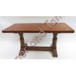 A Robert Thompson Mouseman oak coffee table, 45cm high, 90cm long, 38cm deep