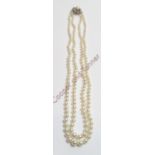 A graduated two row cultured pearl necklace, the 94 and 86 pearls of approximately 3.1mm to 7.5mm,