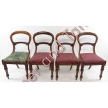 A set of four Victorian mahogany balloon back chairs, on turned legs, along with another similar