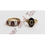 A 9 carat gold five stone opal and garnet ring, finger size M; with an initial ring stamped '9ct',