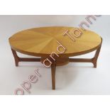 A mid century oak and walnut oval table, 41cm high, 91cm long, 58cm wide