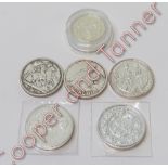 A 2003 silver £1 coin, encapsulated; together with five silver £20 commemorative coins, years -