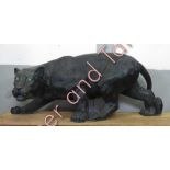 A large life-size fibreglass model of a panther, 137cm long, 50cm high