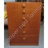 A mid century teak six drawer chest of drawers, 102cm high, 68cm long, 43cm deep