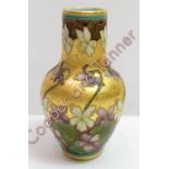 An Art Nouveau vase by Felix Optat Milet, decorated with stylised flowers and leaves in coloured