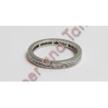A platinum diamond set eternity ring, channel set with forty brilliant cuts totalling