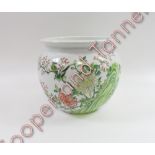 A large Chinese jardiniere decorated with various flowers and butterflies, 31cm high, 32cm diameter