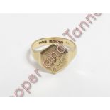 A 9 carat gold signet ring, inscribed, finger size U, 5.3 g gross