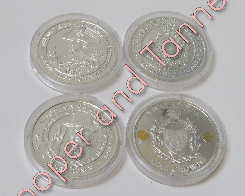 Three UK and Commonwealth encapsulated commemorative coins, years - 2005, 2007 and 2010; together