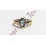 A 9 carat gold blue topaz single stone ring, finger size J, 3.1 g gross