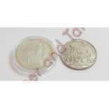 A 2006 Britannia £2 one-ounce coin, encapsulated; and a 2007 Britannia £2 one-ounce coin