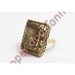 A smoky quartz single stone dress ring, stamped '9ct', finger size M, 7.3 g gross