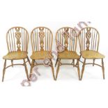 A set of four oak spindle back chairs