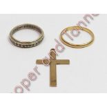 A 22 carat gold wedding ring, 2.2 g gross; with a cross pendant stamped '9ct', 0.9 g gross; and a