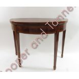 A Victorian mahogany D end card table, on tapering legs, 73cm high, 95cm diameter