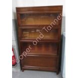 A four section Globe Wernicke style bookcase, 146cm high, 86cm long, 25cm deep