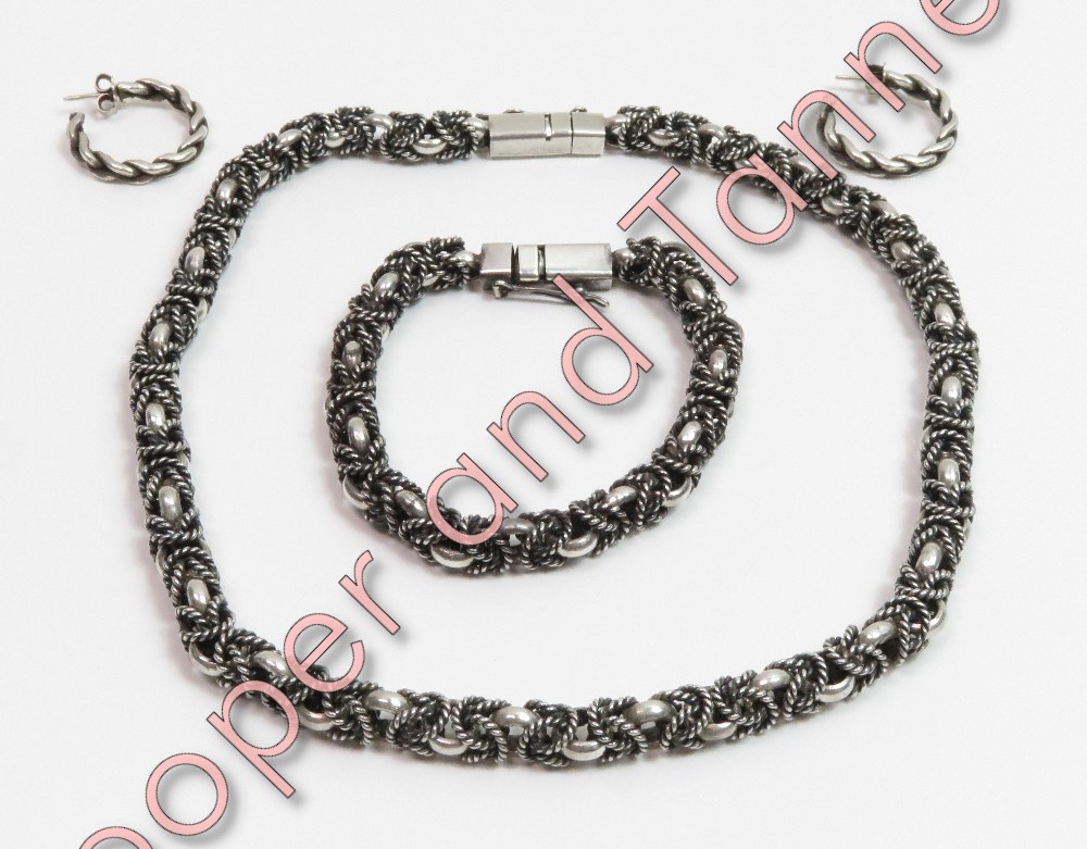A heavy Polish silver chain and matching bracelet