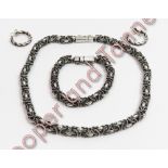 A heavy Polish silver chain and matching bracelet