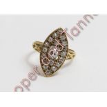 A late Victorian diamond marquise cluster ring, indistinct marks, the principal old mine cut of