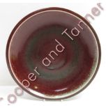 Berndt Friberg for Gustavsberg, a low stoneware bowl in an oxblood glaze, signed to the base, 29.5cm