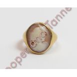 An 18 carat gold shell cameo ring, finger size O, 11.6 g gross
