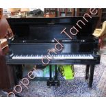 A modern ebonised Chappell of London baby grand piano, approximately 150cm long max.