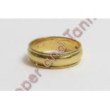 An 18 carat gold wedding ring, finger size Q ½, 5.5 g gross