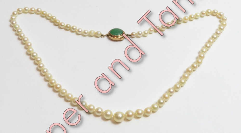 A slightly graduated row of cultured pearls, the seventy seven pearls of approximately 5 mm-6.5 mm