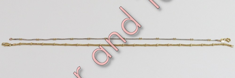 A 9 carat gold ankle chain, of bead like links, 24 cm long; and a 9 carat white gold ankle chain