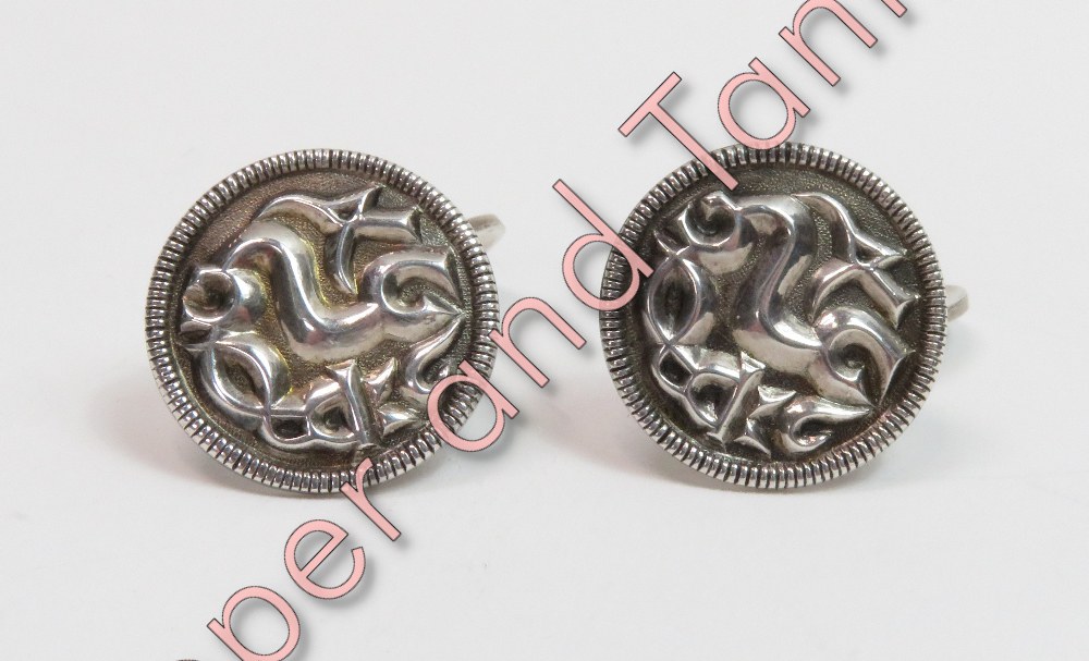 David-Andersen, Norway, a pair of silver cufflinks utilising a Viking design from 500AD