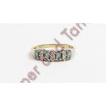 A synthetic stone set 9 carat gold half hoop ring, finger size M, 1.7 g gross