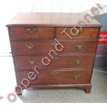 A 19th century mahogany chest of drawers, with brass swing handles raised on on bracket feet, 74cm