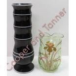 An enamelled Art Nouveau light green glass vase, together with a black and white glass vase in the