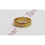 A patterned 22 carat gold wedding ring, 6.2 g gross