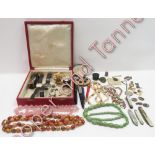 A vintage Cartier necklace box together with a small collection of bead necklaces, men's watches,