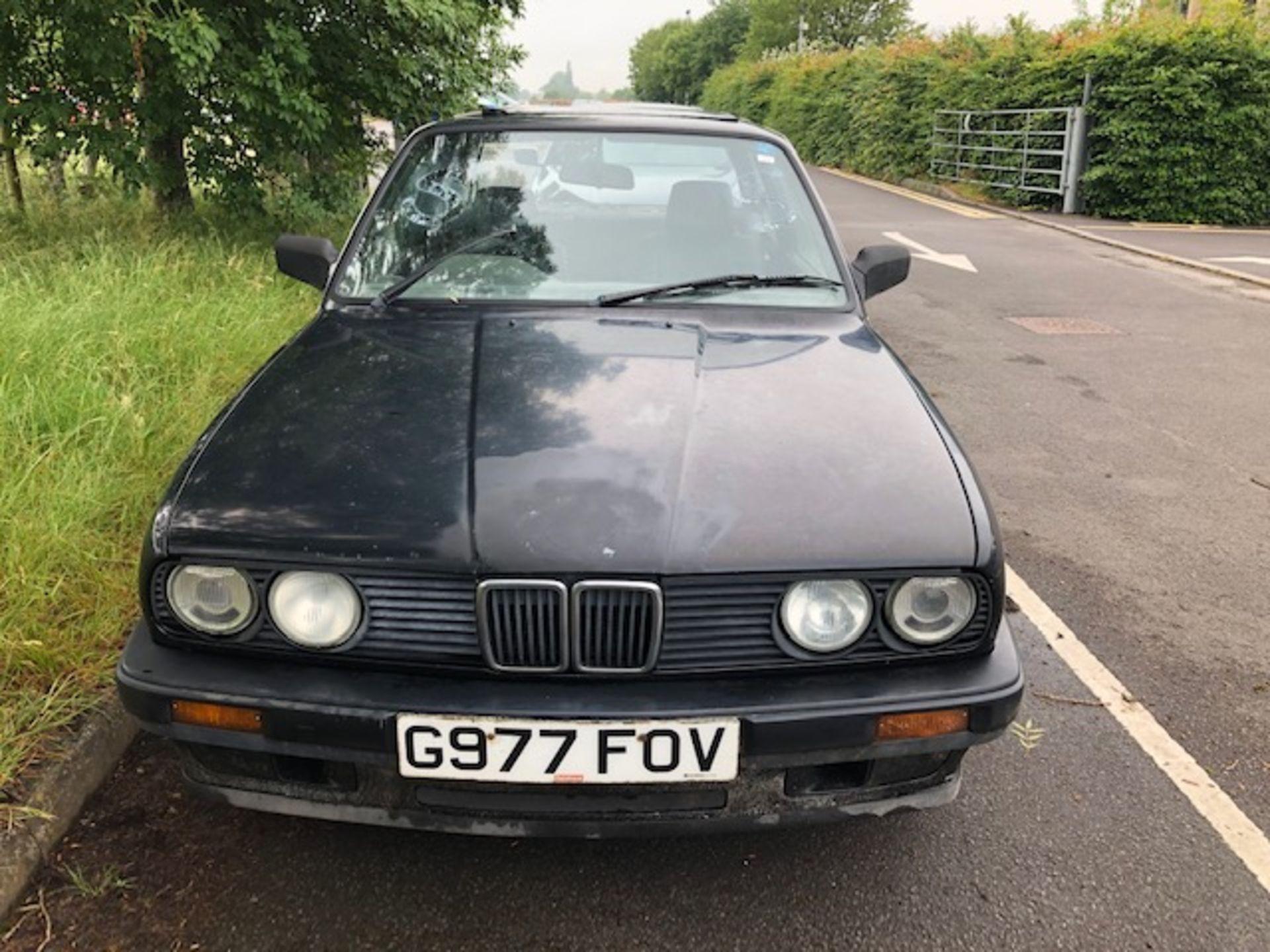 Black 2 door BMW 318i Reg No G977 F0V. We have V5 and keys. A total renovation project or for