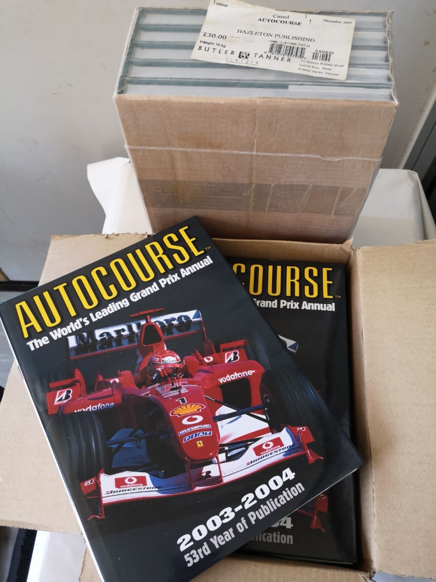 1 box of brand new Autocourse 2003 the worlds leading Grand Prix annual along with 1 unopened box of