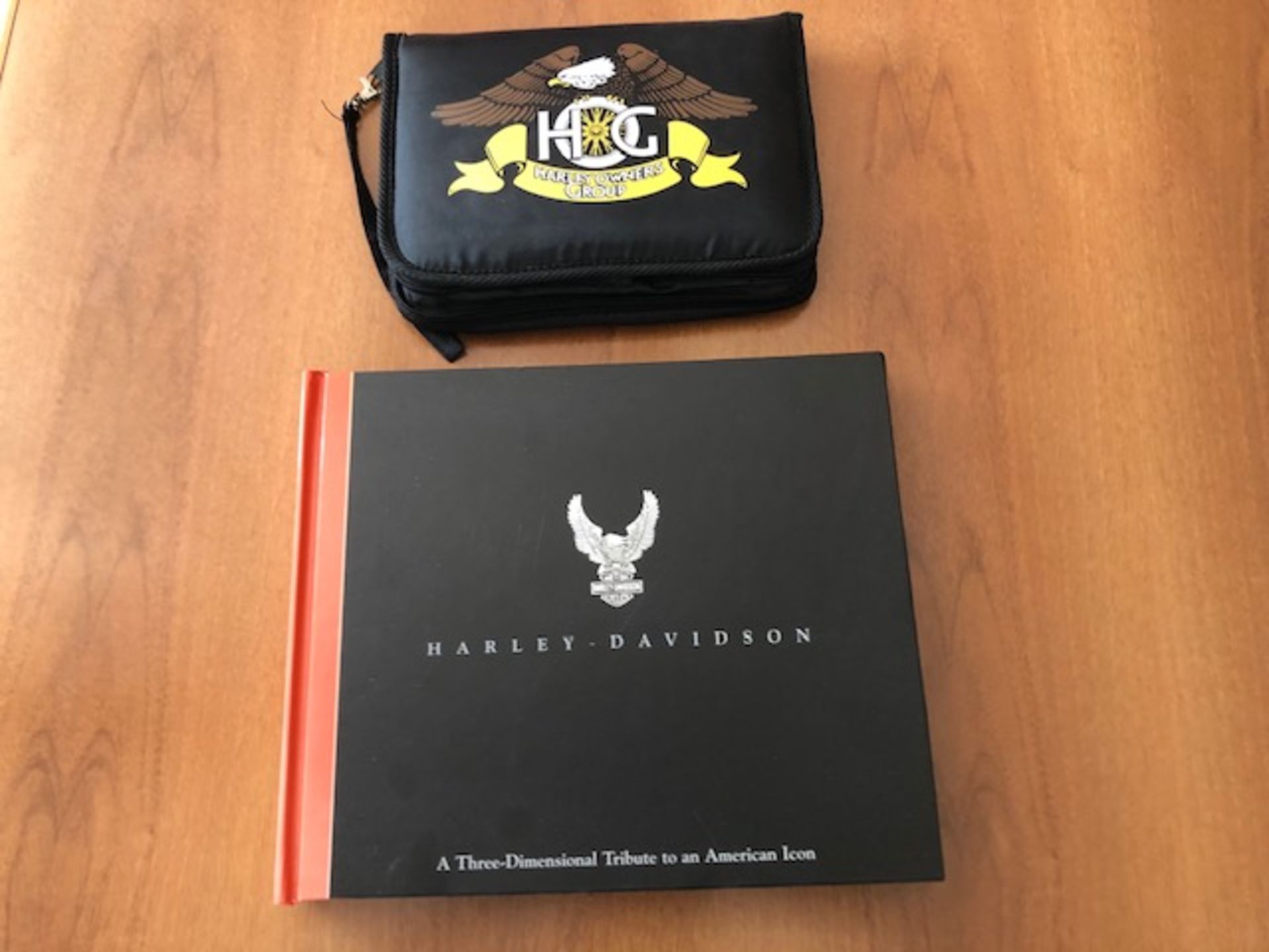 Harley Davidson pop up book in good condition and wallet containing H.O.G. books and badges - Image 2 of 4