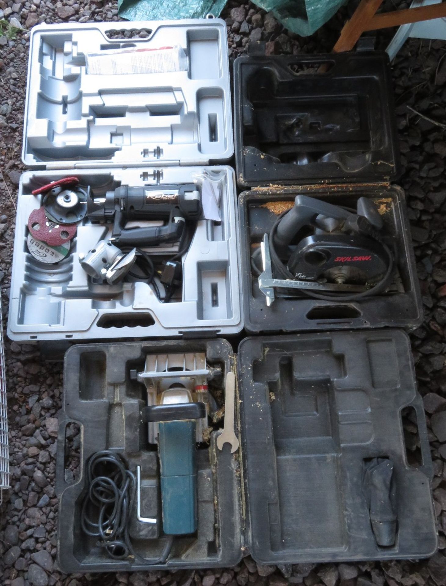 3 boxed tools including rotozip, skill saw and router