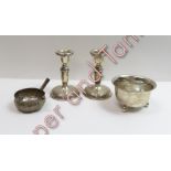 A pair of loaded silver desk candlesticks, 10 cm high; a silver sugar basin on ball supports, 68