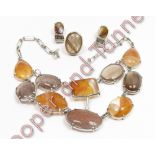 A suite of hardstone set jewellery, including rutilated quartz, comprising a necklace, ring and